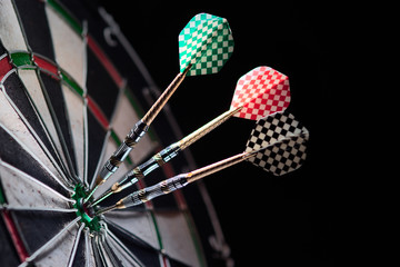 three darts in bulls eye 150