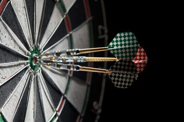 three darts in bulls eye 150