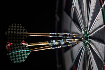 three darts in bulls eye 150