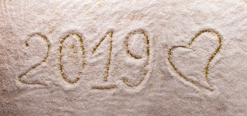 Bright beautiful lettering 2019 new year and a big heart