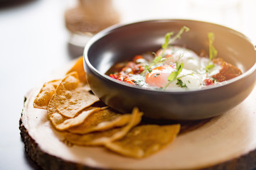 Lunch Time. Fried eggs creative serving on table isolated close-up