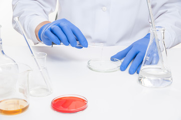 Fototapeta premium view of a human hands in the laboratory while performing experiments