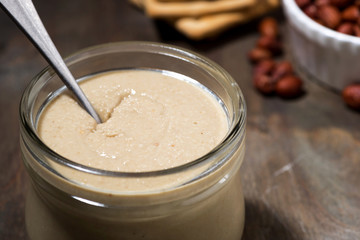 jar of homemade peanut butter, closeup