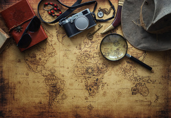 old map and vintage travel equipment / Travel concept