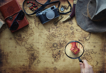 old map and vintage travel equipment / expedition concept or treasure hunt.