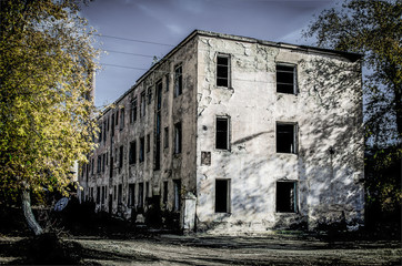 Dead city in Russia abandoned house yard