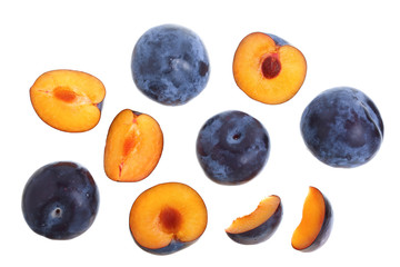 plums isolated on a white background. Top view. Flat lay pattern