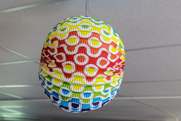 round, coloured as a ball lamp at the ceiling
