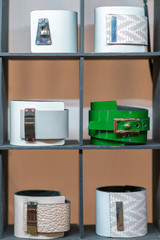 Many various leather and textile bracelets. Leather multi-colored bracelets in the shop. vertical...