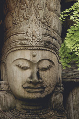 Fototapeta na wymiar Buddha statue wooden old from B.Tawai, Chiang Mai, Thailand