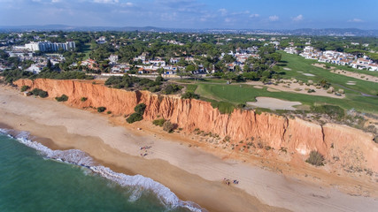 Aerial. View from the sky at the golf courses in the tourist town Vale de Lobo. Vilamoura.