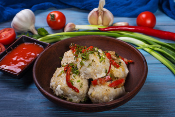 Meatballs in clay plate