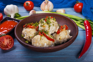Meatballs in clay plate