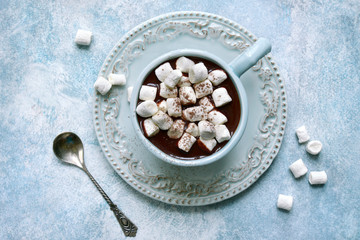 Homemade hot chocolate with mini marshmallow.Top view with copy space.
