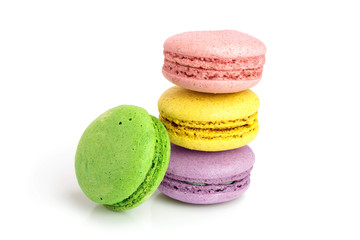 four macaroons isolated on white background closeup