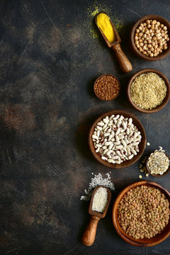 Assortment of grains, cereals and legumes.Top view with copy space.