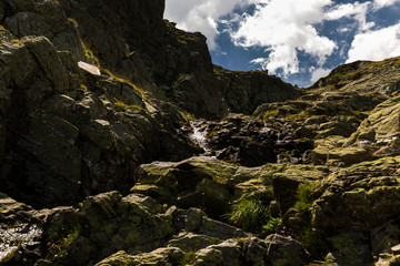 A small steep mountain waterfall