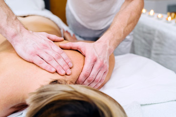 hands of massage therapist 