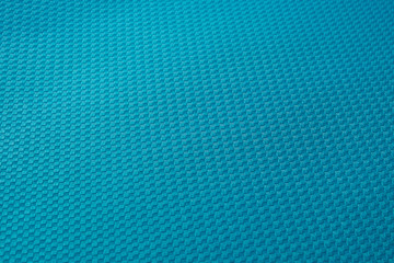 Dark blue monophonic background consisting of small light and dark squares and lines