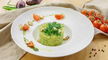 Salad with fresh vegetables in a white plate