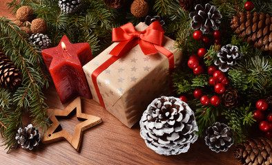 Fototapeta na wymiar Christmas decoration on wooden desk with Christmas present