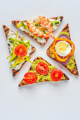 Delicious colorful avocado sandwiches, healthy diet snacks