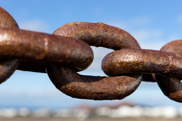 Big rusty chain link. Closely and inseparably connected