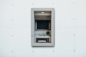 Modern street ATM machine for withdrawal of money and other financial transactions.