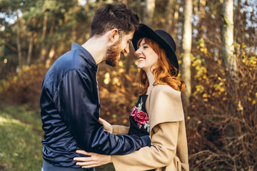Happy young romantic couple spend time together outdoor.