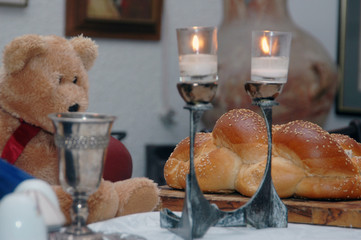 A teddy bear at the Jewish Shabat table