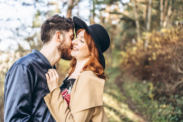 Happy young romantic couple spend time together outdoor.
