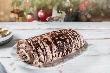 Belgian Chocolate Meringue Roulade filled with whipped cream and