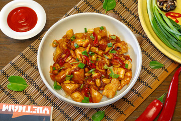 Chinese dish of chicken and rice on a plate, top view