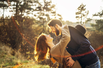 Fototapeta premium Happy young romantic couple spend time together outdoor.