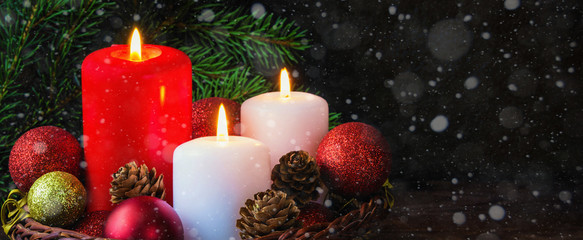 Christmas decor candles in the New Year's composition festive decoration