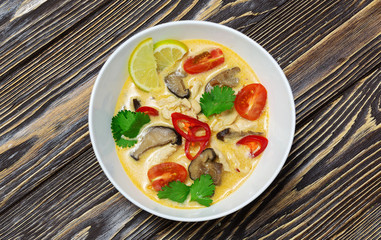 Chinese, Vietnamese soup, tom yam, pho, on wooden background, top view