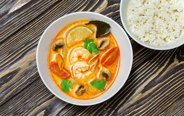 Chinese, Vietnamese soup, tom yam, pho, on wooden background, top view