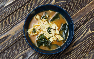 Chinese, Vietnamese soup, tom yam, pho, on wooden background, top view