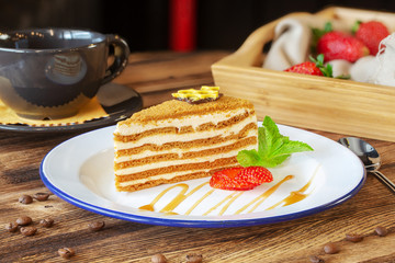 Sweet dessert with berries and herbs on a plate