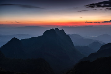 Mountain range with stars in twilight at wildlife sanctuary