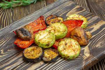 Grilled vegetables on wooden background