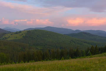Fototapeta na wymiar Sunrise in the mountains in the summer.