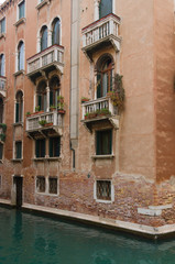 Fototapeta na wymiar Balconies in Venice overlooking the canal