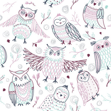 Cute owls seamless pattern in boho style with ornaments.