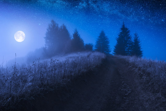 Rising of the moon over the misty valley