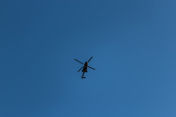 Helicopter flying over the sky