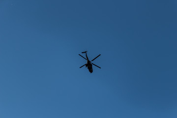 Helicopter flying over the sky