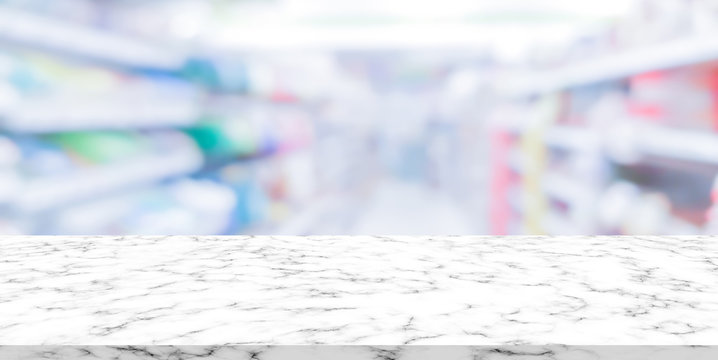 abstract blurred clean pharmacy drug store shelf with medicine for shopping with white marble texture plain for ads,promote product on display	
