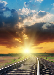 bright orange sunset over railroad closeup