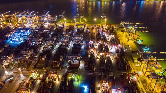 night illuminated city famous cargo working port aerial timelapse panorama 4k hing kong
